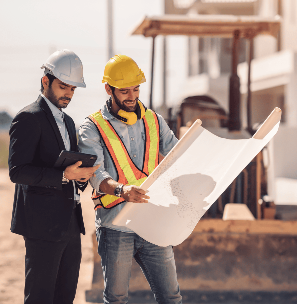 Construction professionals reviewing plans